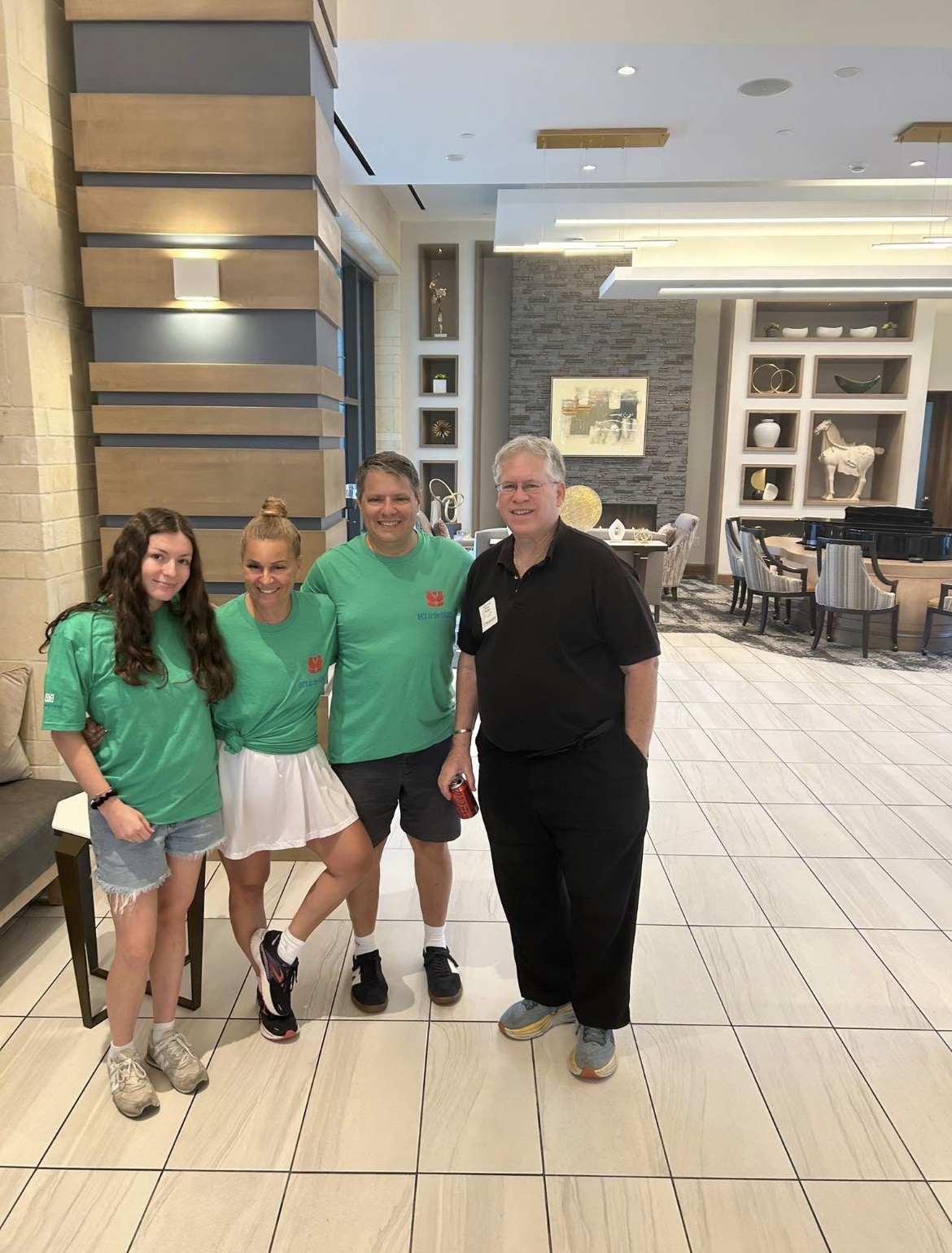 Marci volunteering with her team at a senior living community